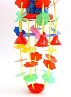 A winding bell spins the traditional dance bell boys and gir