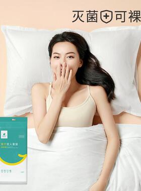 Traveling one-time sheets covered with pillows and two-perso