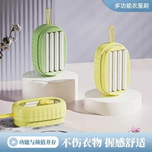 Plastic laundry brush with liquid dispensing roller, suitabl