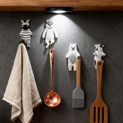 Animal-themed hooks for bedroom walls, featuring cute cartoo