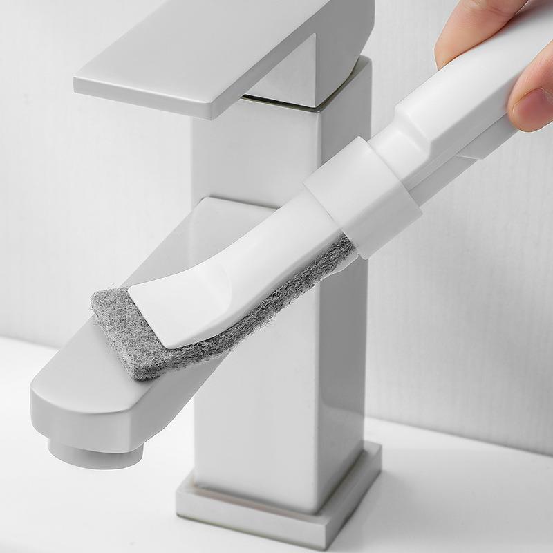 Scouring pad cleaning brush for removing dirt from crevices