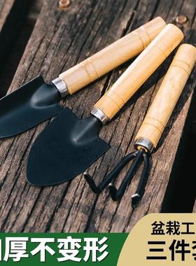 A small gardening spade for planting flowers and digging wil