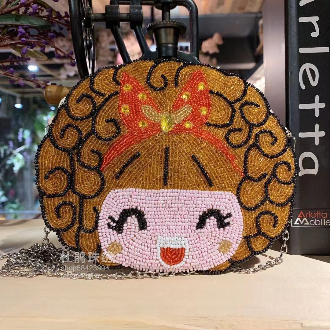 杜鹃珠绣新品手工可爱日韩甜美淑女卷发蝴蝶结娃娃斜挎串珠手机包