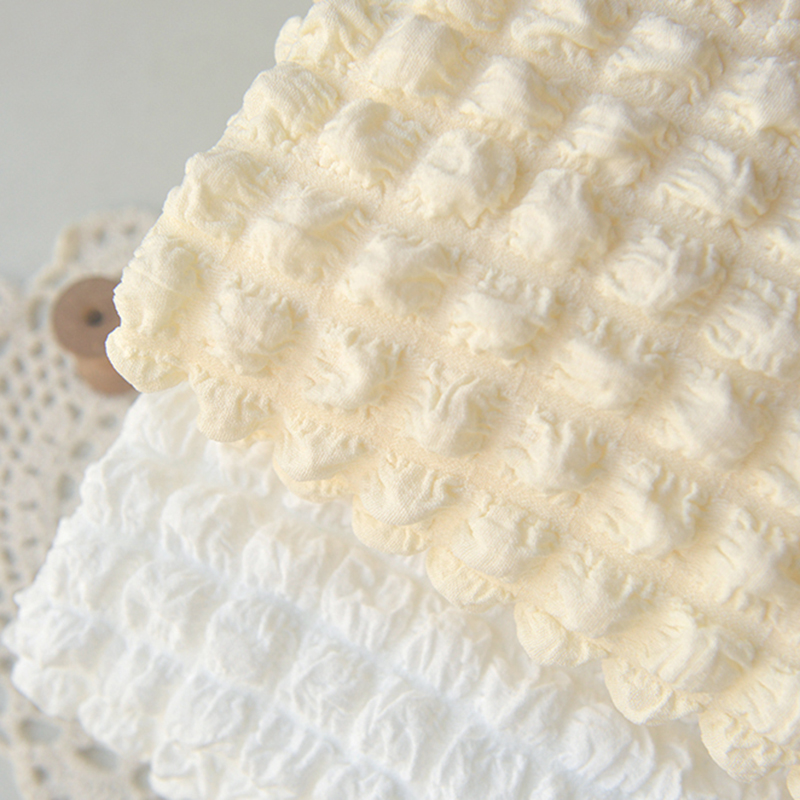 淡米黄重磅泡泡格布料