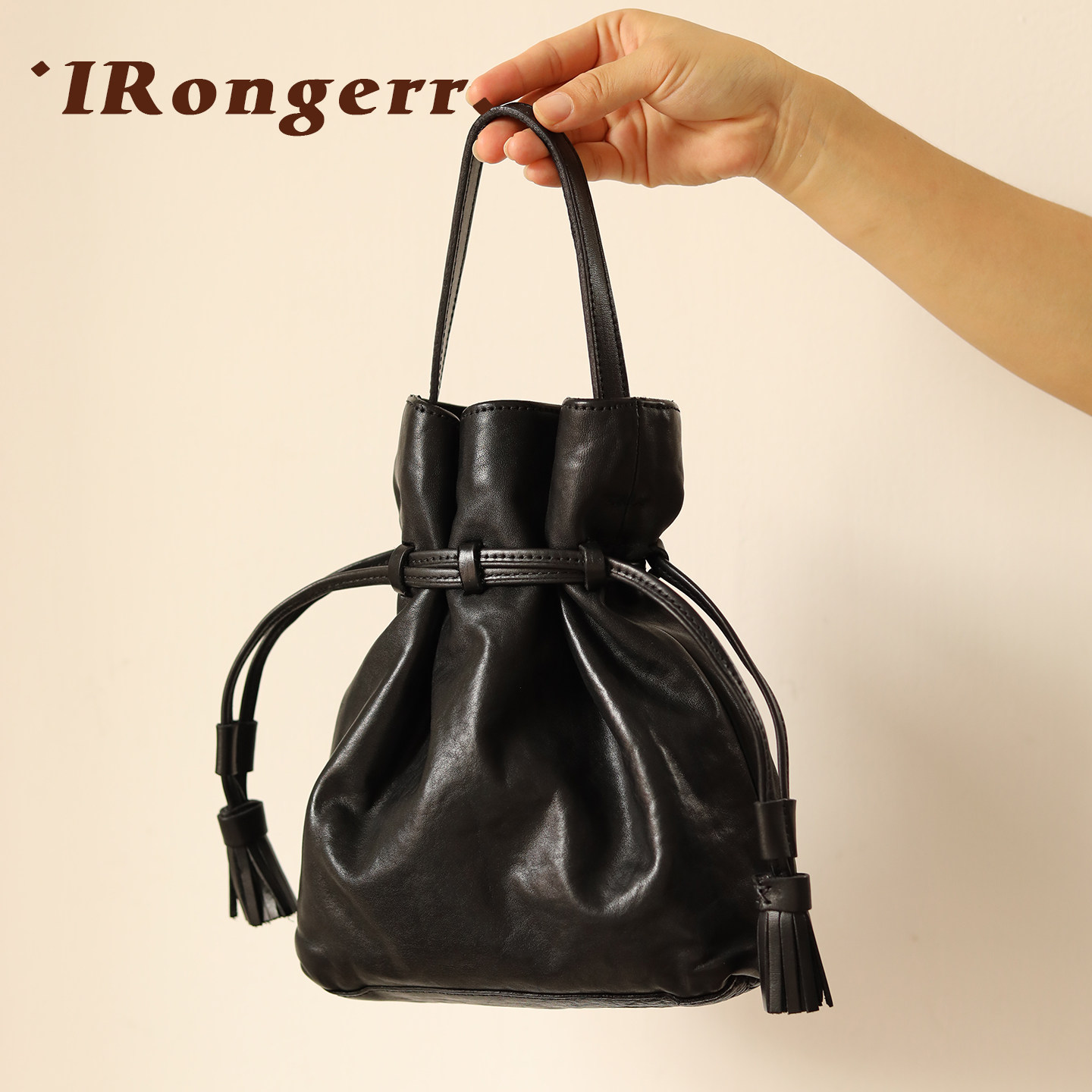 荣轻复古手工牛皮手提水桶包植鞣皮流苏抽绳斜挎包小众设计单肩包