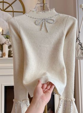 2025年春季高领木耳边打底衫重工镶钻蝴蝶结亮片宽松长袖毛衣女装
