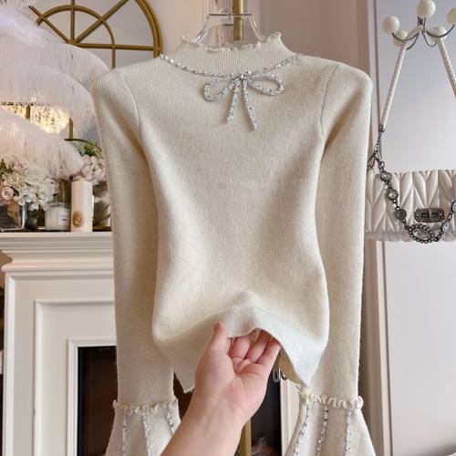 2025年春季高领木耳边打底衫重工镶钻蝴蝶结亮片宽松长袖毛衣女装