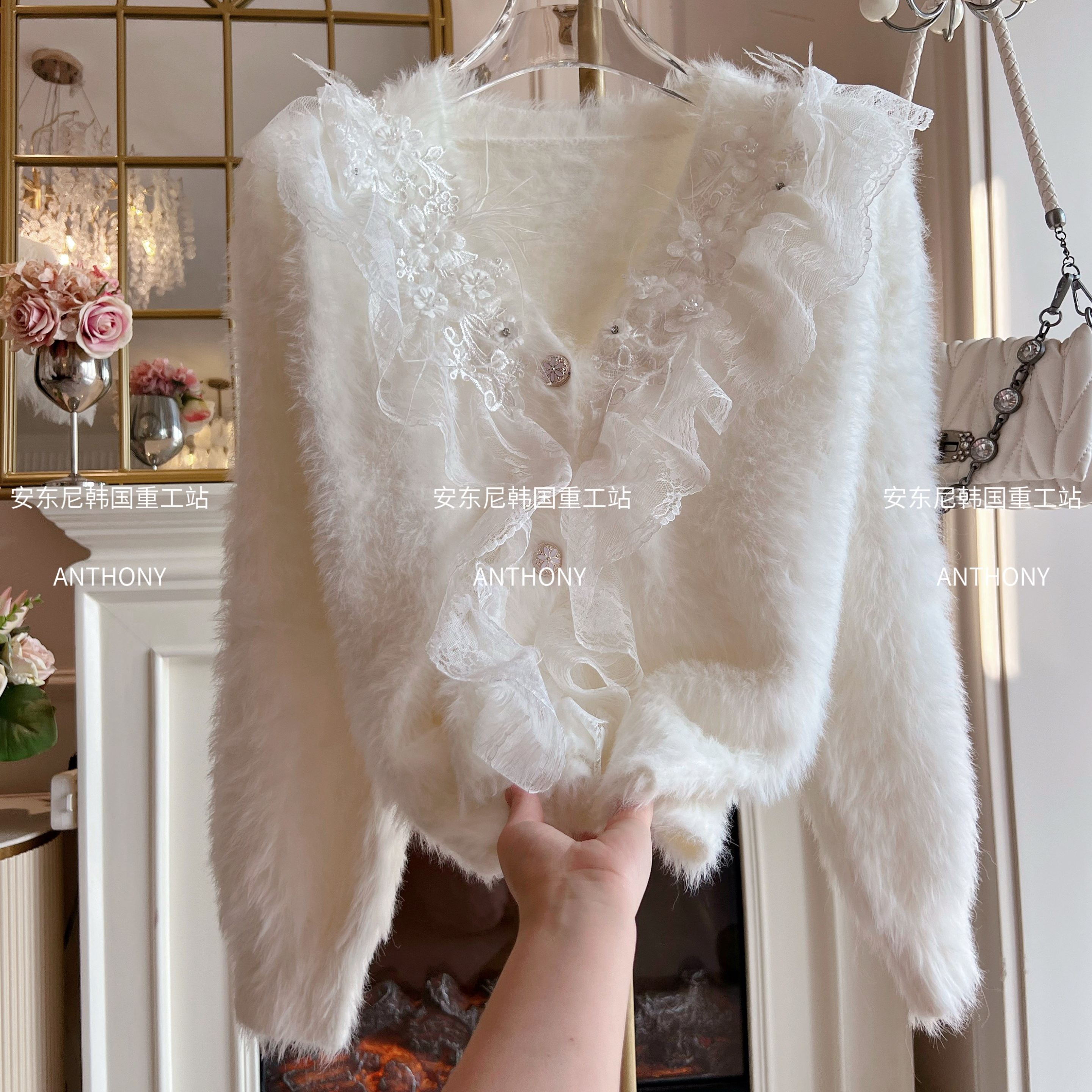 水貂绒加厚毛衣外套女2025年冬季新款重工镶钻羽毛气质毛绒绒开衫