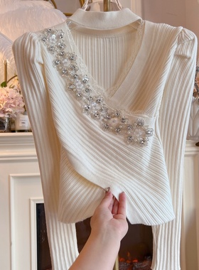 羊绒温柔风针织衫女装2024年冬季不规则交叉修身气质优雅长袖毛衣