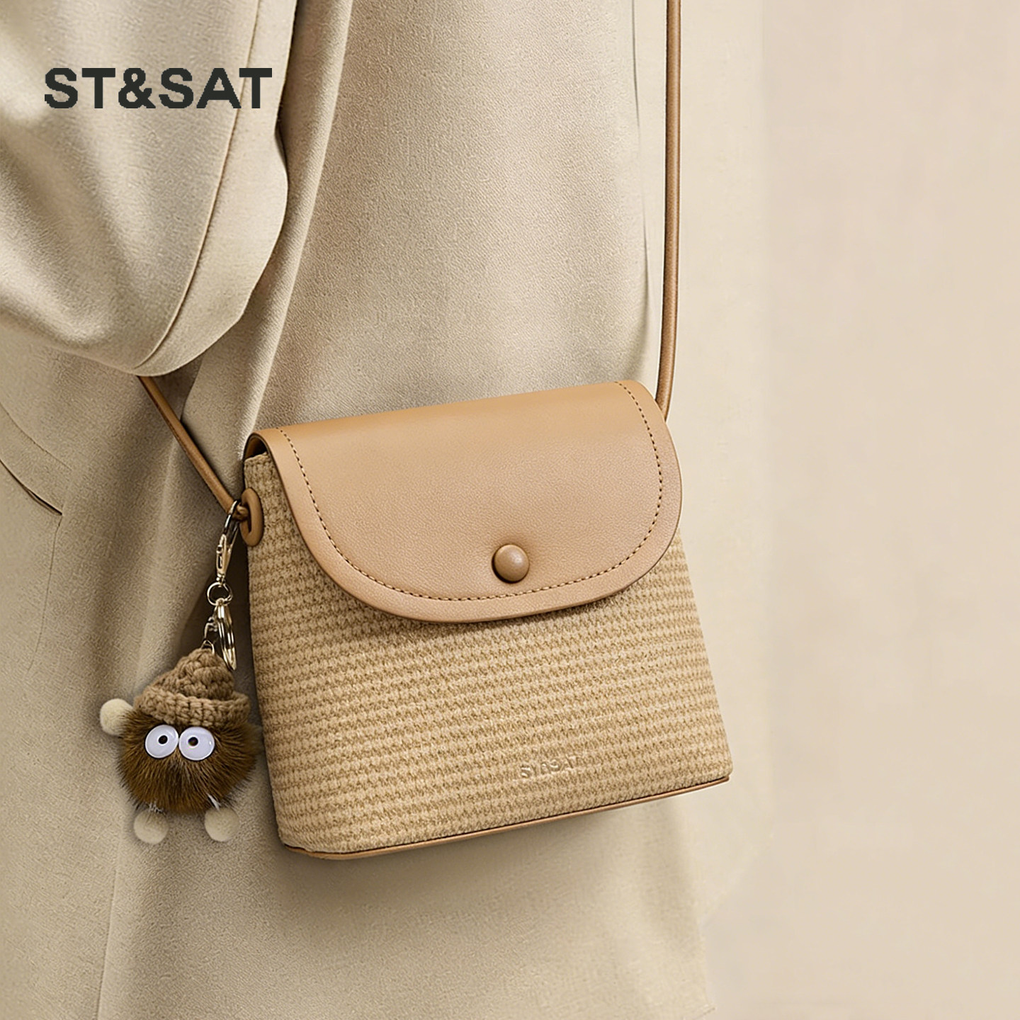 星期六编织手机包迷你小包包女式2026新款时尚百搭通勤斜挎水桶包