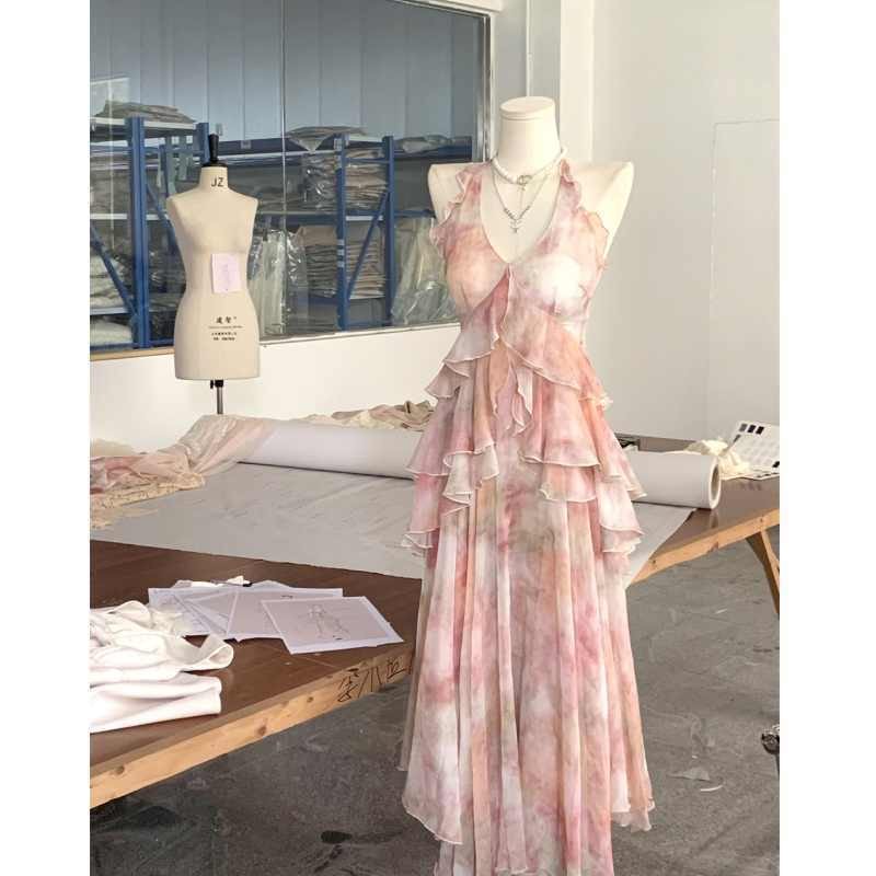 法式气质油画印花吊带连衣裙女夏季新款度假风不规则荷叶边长裙子