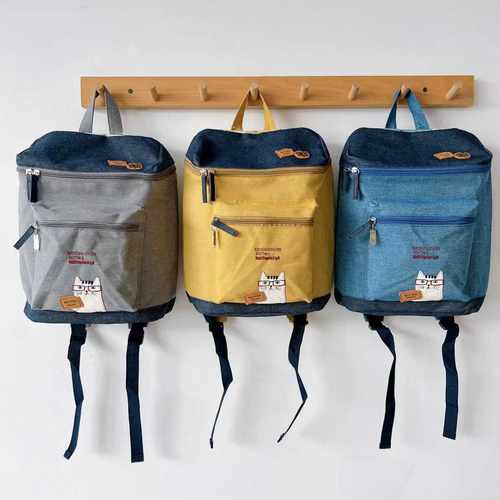 日本品牌刺绣眼镜猫逛街购物背包