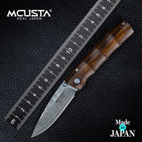 Mcusta传世家徽折叠刀日本进口