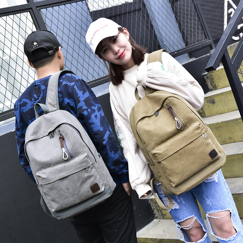 双肩包男休闲帆布电脑包旅行背包初中高中大学生书包男女时尚潮流