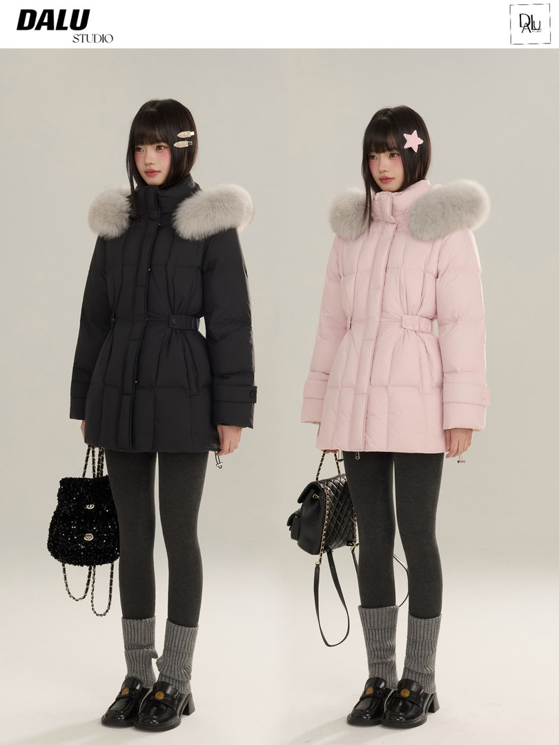 Two models wearing fur-trimmed winter puffer coats in black and pink