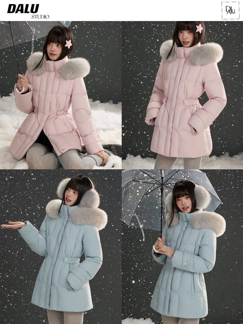 Model wearing a fur-trimmed winter puffer coat in pink and light blue