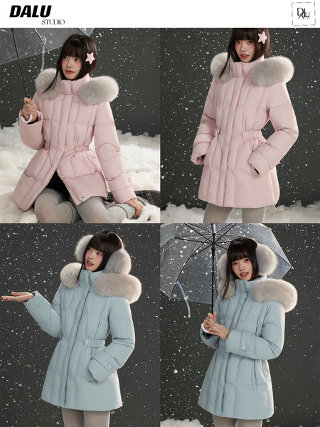 Model wearing a fur-trimmed winter puffer coat in pink and light blue
