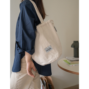 MOREGOOL 23/SS 原创大容量白色帆布抽绳水桶包 单肩厚实帆布包