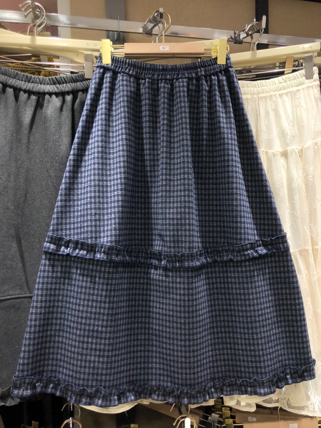 复古磨毛格子木耳边拼接半身裙女口袋伞裙休闲高腰百搭花苞裙长裙