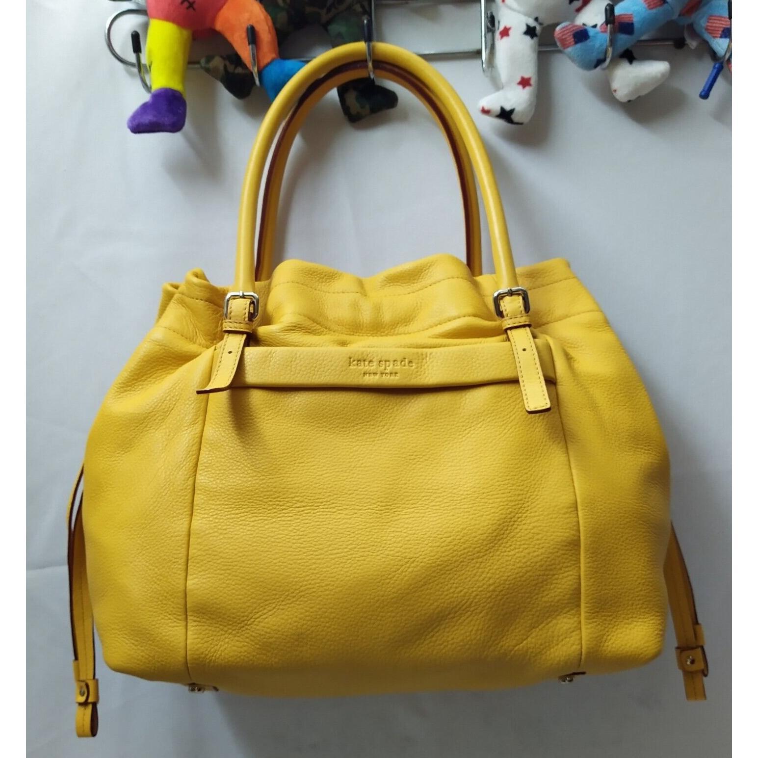 kate spade New York黄色荔枝皮抽绳双手柄两用单肩包