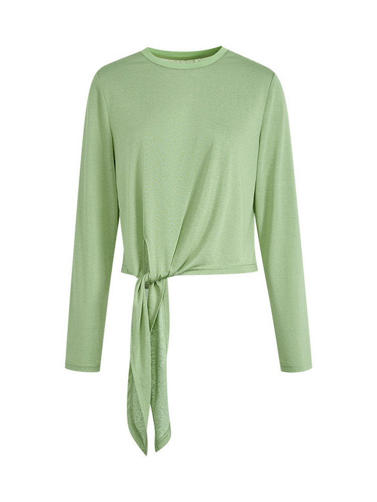 Light green long sleeve tie-front top on a white background