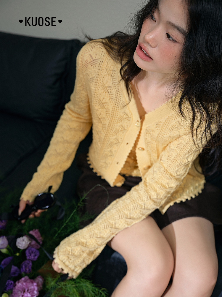 Yellow knit cardigan worn by a model