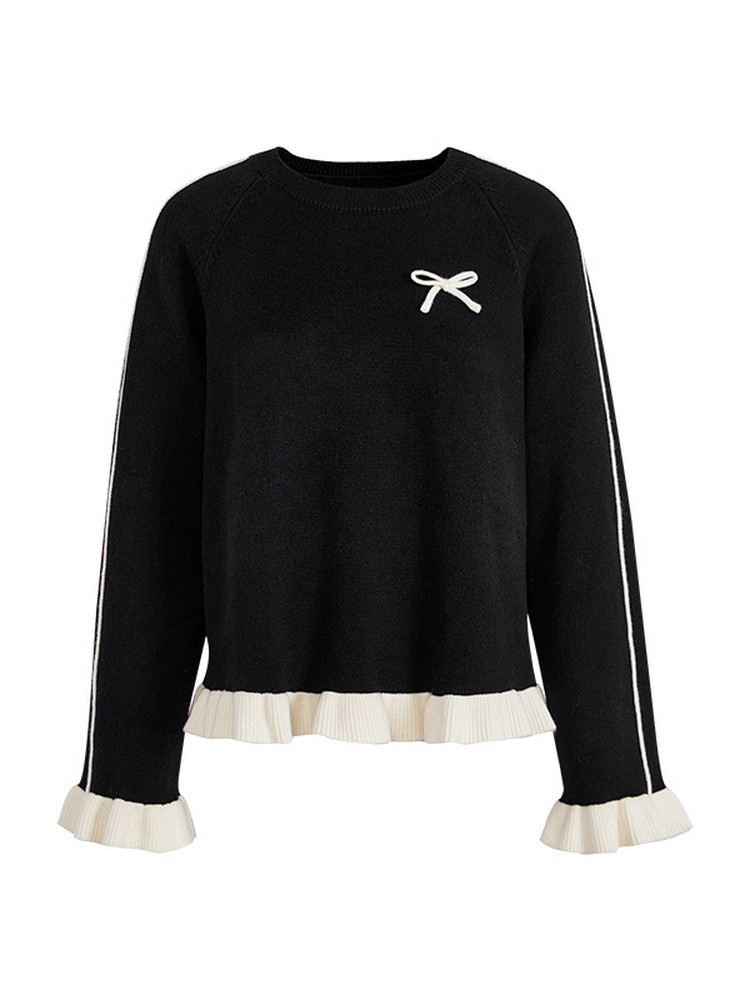 Black long-sleeve sweater with white trim and bow detail on white background