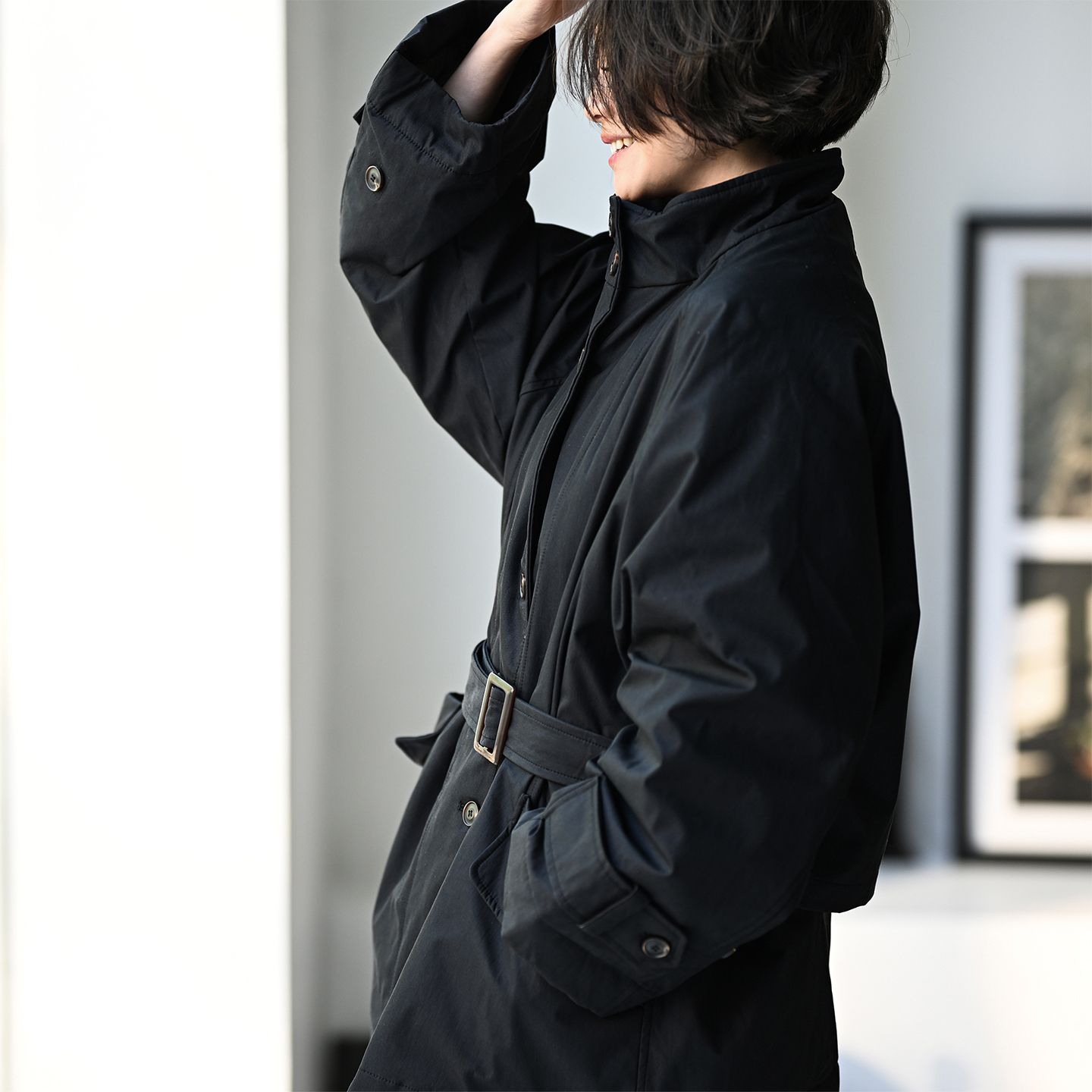 黑色立领收腰宽松加厚羽绒服