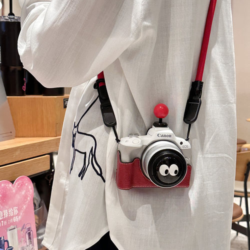 佳能R50保护套R10相机包可爱热靴R100底座包R50V200D二代背带配件