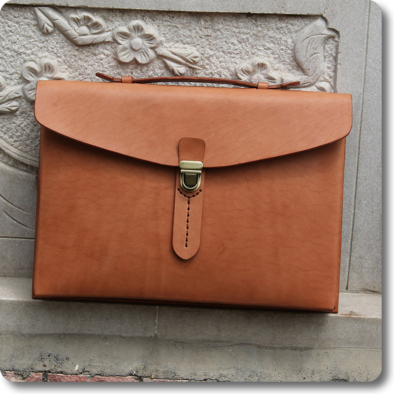 头层硬牛皮公文包手提包笔记本电脑包档案包植鞣牛皮定型复古包