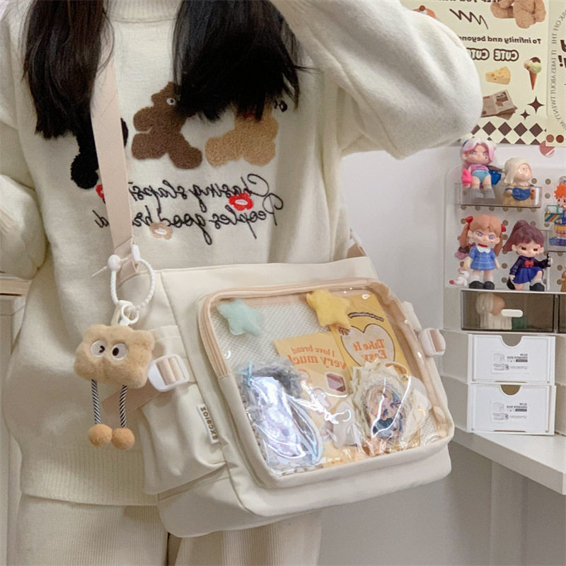 学院风百搭简约二次元大容量邮差包女透明吧唧单肩包斜跨痛包