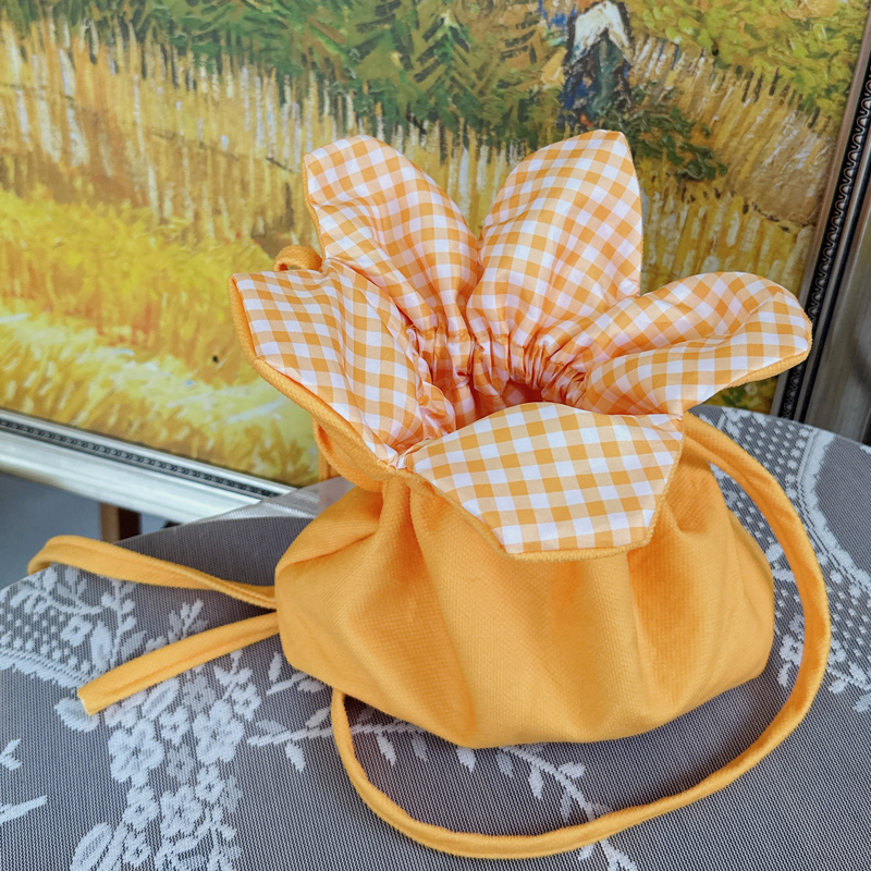 韩系可爱黄色格子小花包女2025新款简约通勤双肩包便携手提水桶包