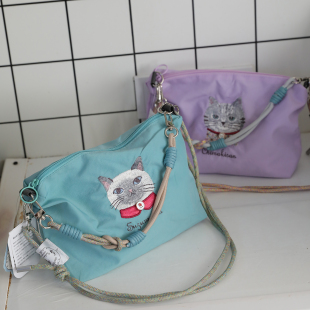 精品刺绣重工多用途手提包斜挎袋手拿包Kusuguru正品 微防水易打理