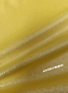 明黄色弹力服装面料 闪光烫金垂顺柔软满天星反光人鱼姬田园布料
