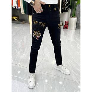 2025秋冬男士牛仔裤个性化虎头热钻石时尚修身加厚休闲时尚小脚男