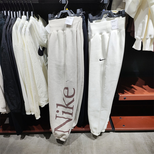 正品NIKE/女子秋季运动休闲加绒保暖印花收口针织长裤 FN2553-104