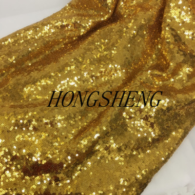 3mm金黄色亮片特密舞台装布料