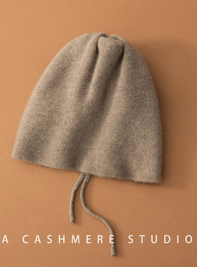 紫绒色秋冬山羊绒抽绳堆堆帽女冬季保暖百搭针织帽子马尾辫可调节