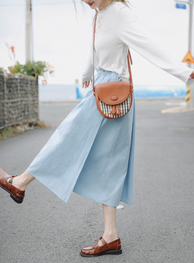 花吉Q430白色撞色木扣一件式裹裙棉质百搭大摆裙2026新款秋半身裙