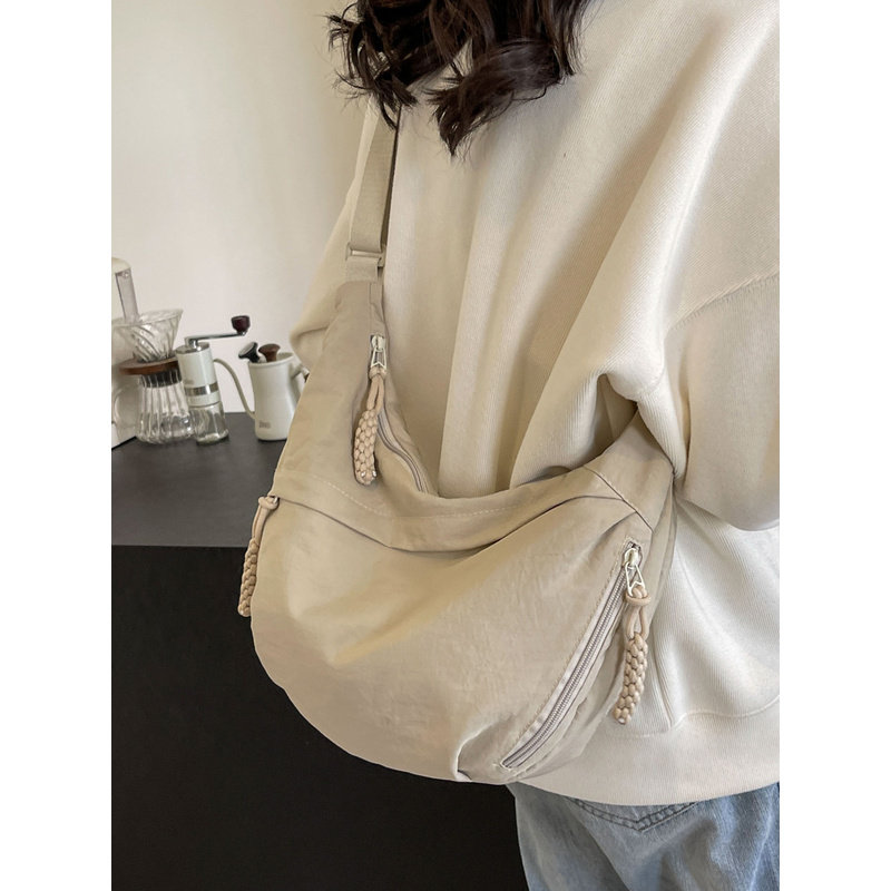 法国CavienKIon饺子包女单肩包韩版通勤旅游上课背包托特包斜挎包