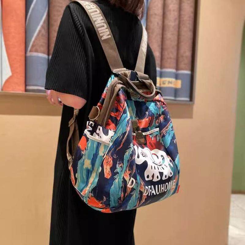 法国CavienKIon轻便外出女包包旅游双肩包旅行休闲女士背包小吉象