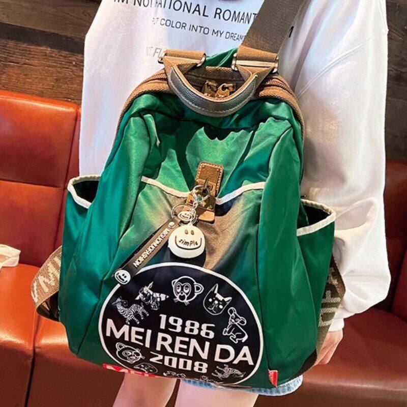 法国ZAMP轻奢潮牌印花背包休闲百搭双肩包笑脸轻便大容量旅行背包