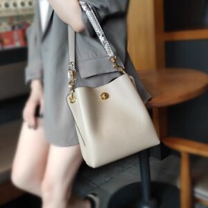 法国MK&ins真皮女包包2024新款大容量水桶包简约单肩包斜挎包通勤