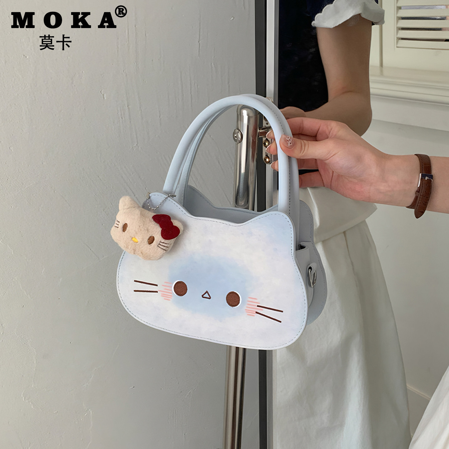 儿童斜挎包女孩2026新款可爱卡通小猫咪手提包精致公主风生日礼物