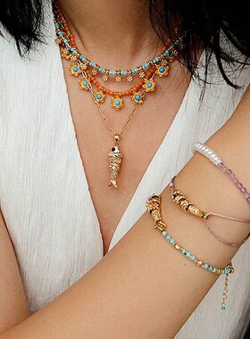 跨境畅销波西米亚风灵动小鱼松石串珠手链女彩色编绳抽拉锦鲤手链