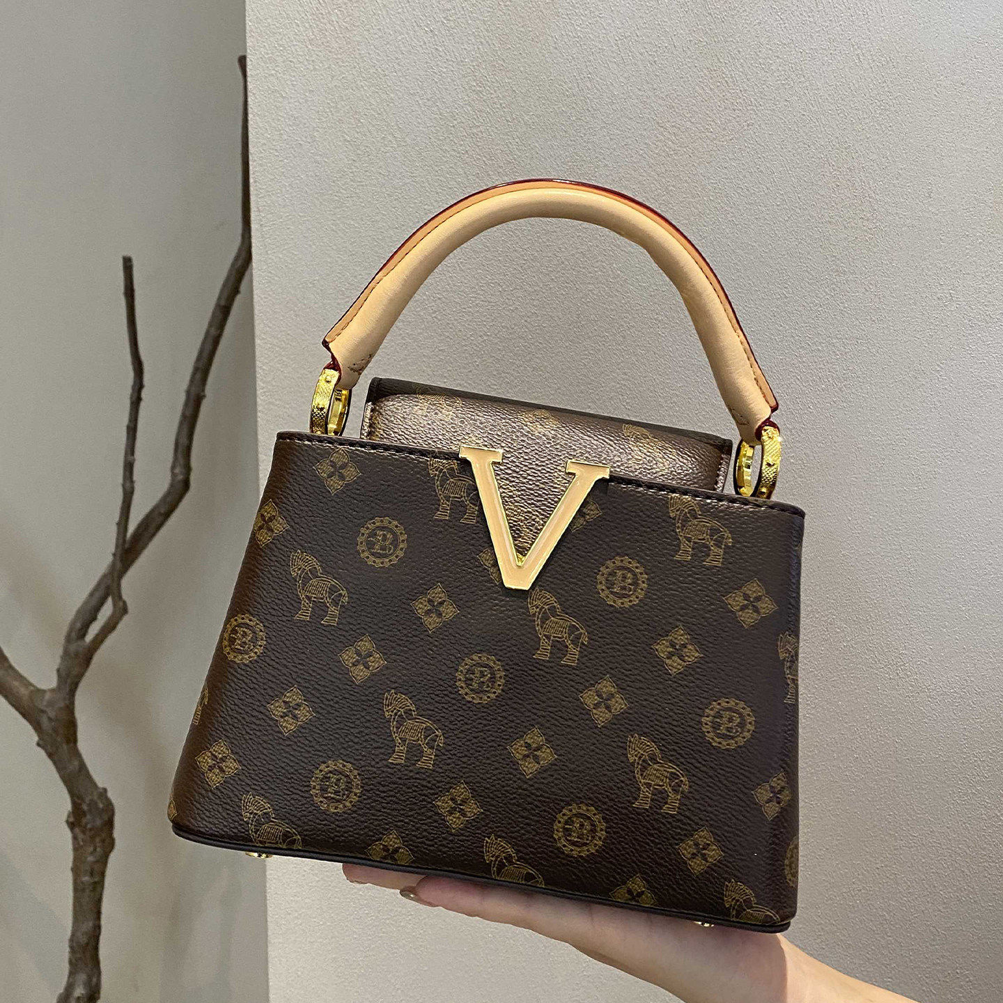 包包女士2026新款高级感洋气轻奢风小众迷你水桶包手提单肩斜挎包