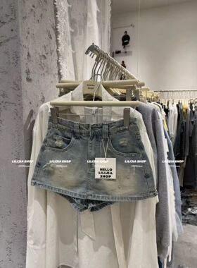 韩国东大门2026新款复古水洗破洞高腰A字牛仔半身裙女潮