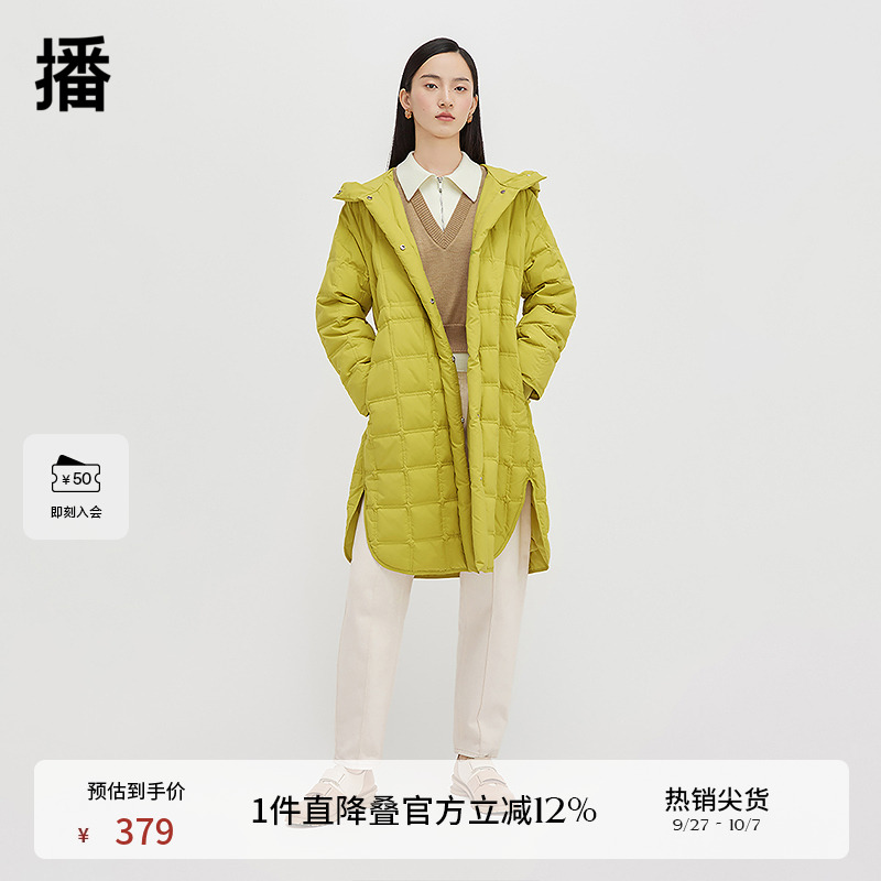 金属纽扣装饰，下摆弧形开叉