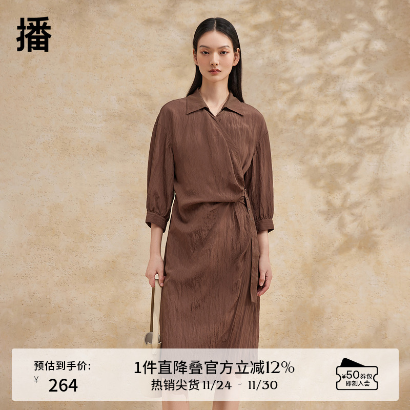 不对称褶皱系扣收腰，设计感斜切下摆