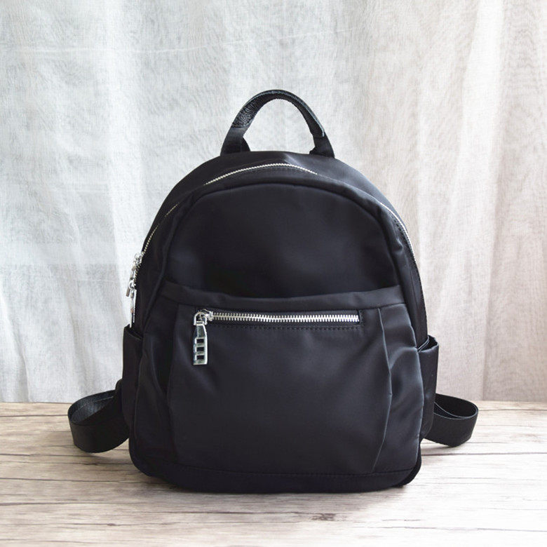 外贸出口旅行防水双肩包牛津布女士休闲小背包简约尼龙妈咪女包黑